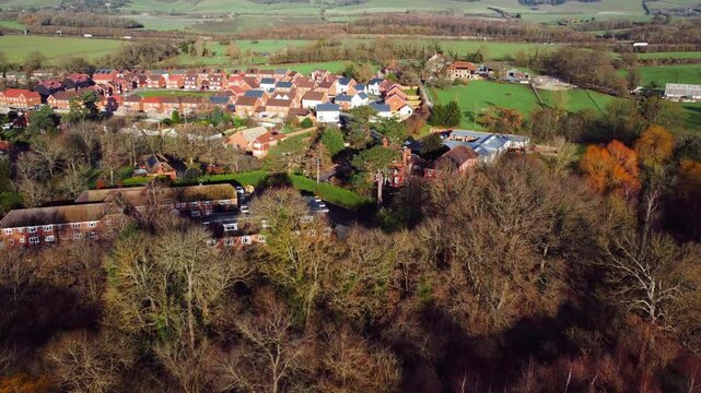 Aerial footage of Bearsted Woodland Trust on a sunny day in Bearsted, Maidstone, England, UK