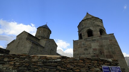 Ancient stone church towers in Kazbegi, Georgia.