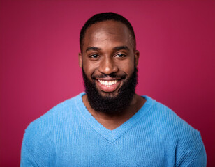 Fototapeta premium Headshot Portrait of a Smiling Man with Contemporary Style, Isolated on Color Background with Ample Copy Space