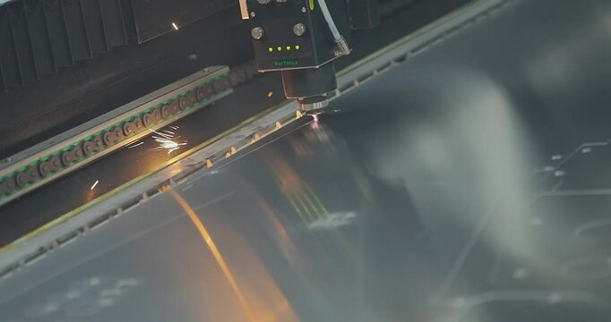 Laser cutter Plasma cutter work at the factory. The process of cutting a metal part with a laser cutter. The laser cutter will cut the part.