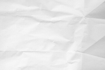Crumpled white paper texture with a soft, wintery feel, perfect for backgrounds and design.