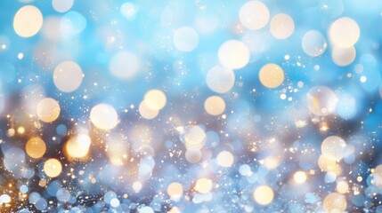 Obraz premium A dreamy blue bokeh background with soft, shimmering lights, creating a magical and festive atmosphere. Ideal for celebrations.