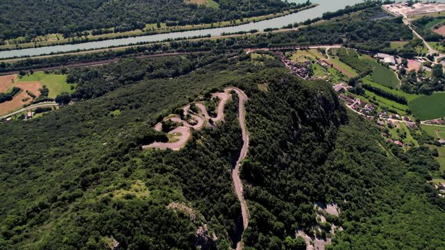 Aerial footage of the Lacets du Grand Colombier, in the town of Culoz in the Ain department, France