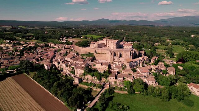 Aerial footage of Grignan commune on a sunny day in the Drome department, France