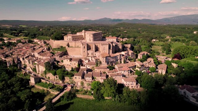 Aerial footage of Grignan commune on a sunny day in the Drome department in southeastern France