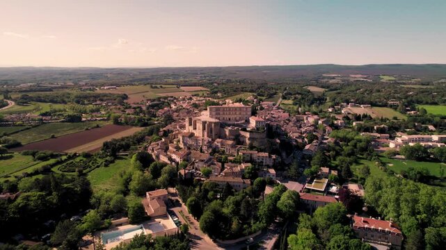 Aerial footage of Grignan commune on a sunny day in Drome department in Auvergne-Rhone-Alpes, France
