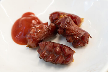 Vienna sausage with ketchup
