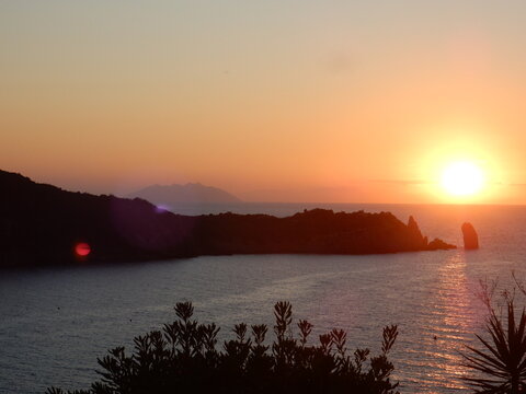 Sunset in Giglio Campese with Montecristo island in the background, Tuscan archipelago, Tyrrhenian sea, Italy