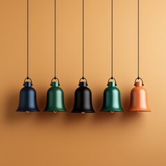 Colorful hanging bells on an orange backdrop
