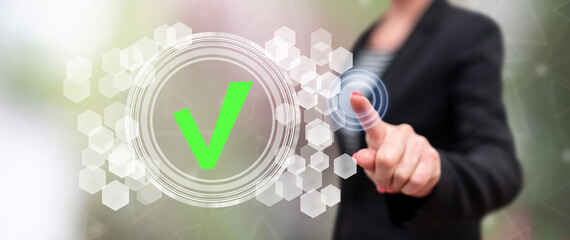 Woman touching a validation process concept