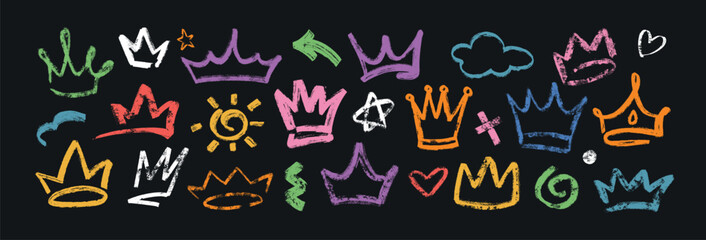 Hand drawn colorful king crowns isolated on black background. Set of brush stroke prince diadems. Grunge princess tiara, royal queen head accessories, stars, dots, sun and wavy lines in graffiti style © redgreystock