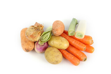 group of vegetables isolated on white , carrots potatoes and leek 
