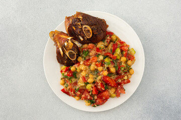 Delicious hearty lunch or dinner, chickpea stew with stewed vegetables, roasted turkey and hummus, healthy delicious food