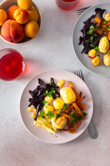 This nutritious meal includes oven-baked potatoes, zucchini, carrots, and beets, served with a refreshing cherry compote, making for a balanced and flavorful breakfast or lunch