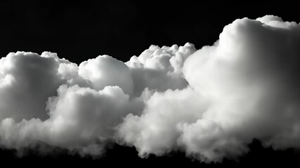 White clouds billow across a dark sky - Powered by Adobe