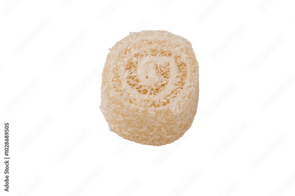 Wall mural Coconut candy roll isolated on a white background.