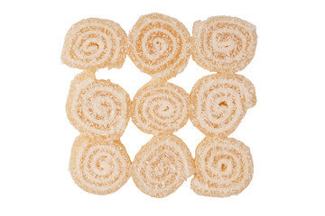 Coconut candy roll isolated on a white background.
