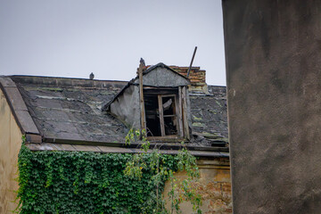 an old, dilapidated tenement house that has not been renovated for a long time. abandoned, dingy...