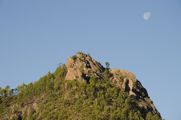 Morro de Pajonales cliff and moon. Tejeda. Gran Canaria. Canary Islands. Spain.