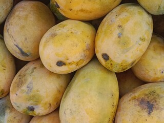 yellow mango fruit pile pattern.Mangifera indica fruit pile pattern