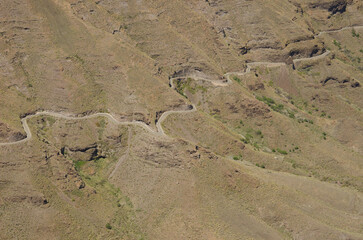Winding road on a hillside. La Aldea de San Nicolas. Gran Canaria. Canary Islands. Spain.
