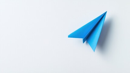 Blue paper airplane and business strategy on white background