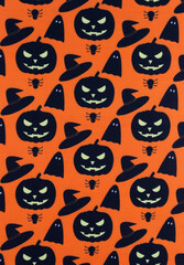 Halloween-themed fabric. Black figures on an orange background, vertical image.