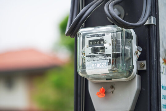 Electric measuring power meter for energy cost at home and office.
