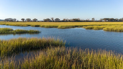 Sunset over low country marsh lands