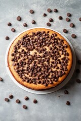 Delicious coffee flavored cake with whipped frosting and chocolate sprinkles on a gray table