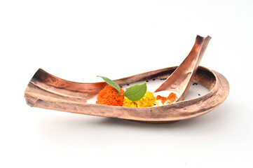 DECORATIVE KOSHA KUSHI SIDE VIEW ON ISOLATED WHITE BACKGROUND WITH SELECTIVE FOCUS.