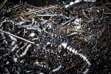 Metal filings collected from turning production processes for future recycling in an industrial...