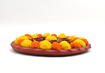 CLAY  PRADIP THALI LOEW ANGLE VIEW ON ISOLATED ON WHITE BACKGROUND. INDIAN PUJA THALI.