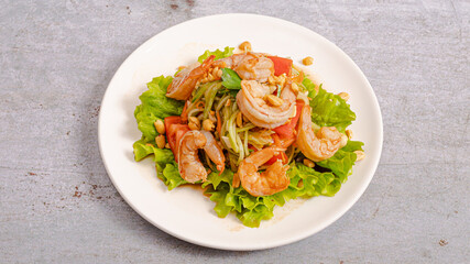 Shrimps salad plate isolated top view