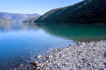 Beautiful mountain lake with rocky shore