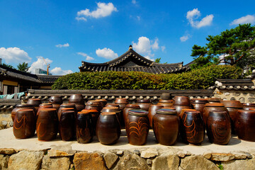 Namsangol Hanok Village, Jung-gu, Seoul, Korea - August 31, 2019: Jangdoks are placed at a traditional korean house. Crocks to contain soy sauce or red pepper paste