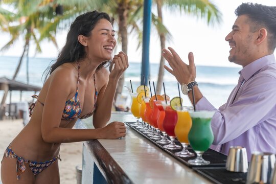 The woman is smiling and the man is laughing