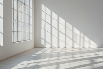 Obraz premium Sunlight Streaming Through a Large Window onto a White Floor and Wall