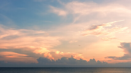 Sunset, Sky Blue and Cloud over Sea in the Evening with Orange, Yellow,Summer Sea Beach with Golden Sunlight,Horizon Seaside view with Dramatic Dusk sky landscape with sunrise in Winter Morning