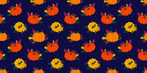 Seamless vector pattern of ripe pumpkins and stripes on a black background