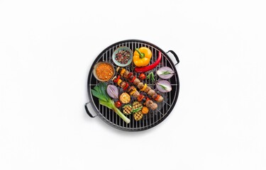 Grilled skewers of meat and vegetables on a black grill.
