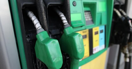 Various gas-diesel and petrol pistols at gas station. Car filling station concept