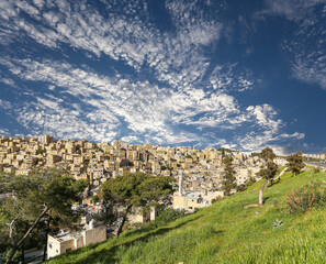 Amman city landmarks-- old roman Citadel Hill, Jordan. Against the background of a beautiful sky with clouds