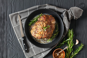 Juicy Roast Pork Neck on table, top view