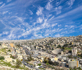 Amman city landmarks-- old roman Citadel Hill, Jordan. Against the background of a beautiful sky with clouds