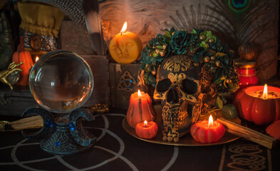 Halloween altar details, spooky wax candles in mystery atmosphere