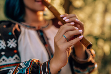 Hand Of Woman Playing On Woodwind Flute - Ukrainian Wooden Sopilka In Forest