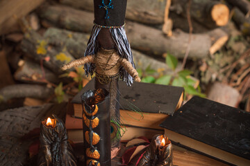 Magic doll for attracting love, rite with voodoo and fate creation, details on a table of witch, occultism concept