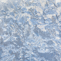 Obraz premium Frost patterns on glass as a background