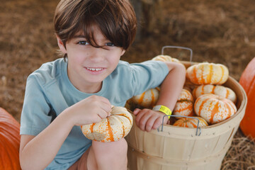 Young Boy Enjoying Pumpkin Patch at Southern Hill Farms in Orlando, Florida – Family Fall Fun